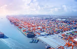 Ship leaving a container port_AdobeStock